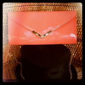 Aldo salmon colored clutch
